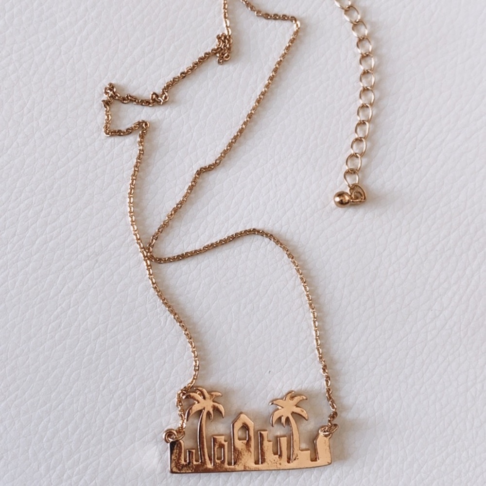 Gold palm tree 🌴necklace